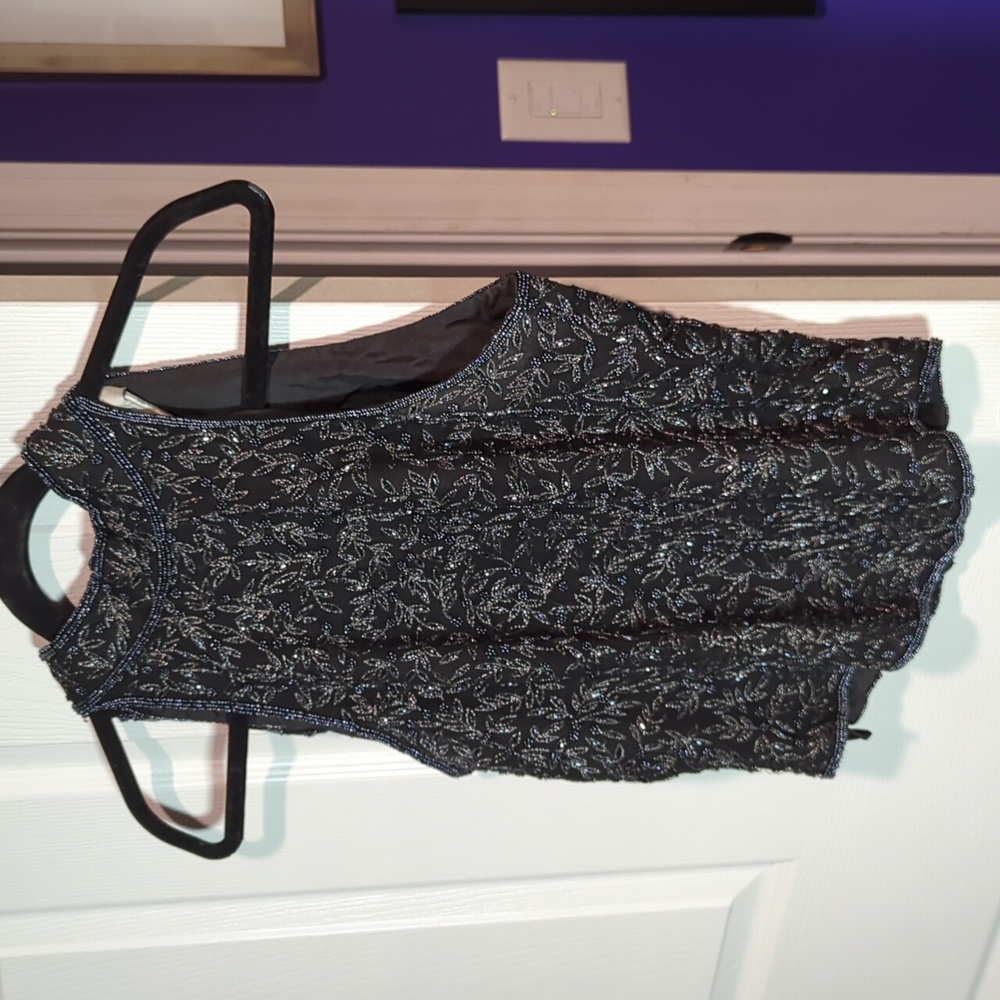 Pretty formal sleeveless top